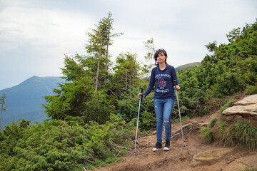 Girl Descend Down a Large Green Mountain Range