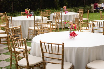 Pattern round table for wedding in garden, luxury decoration with flower, beautiful organized event