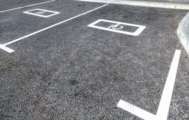 Parking places with handicapped or disabled signs and marking lines
