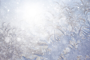 frost patterns on window glass, abstract background winter rime snow