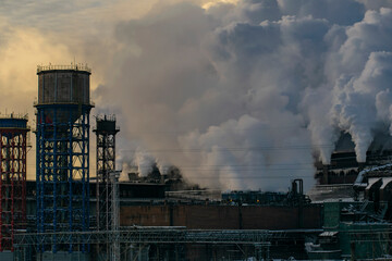 A view of the heavy industry polluting the environment. Ecological concept.