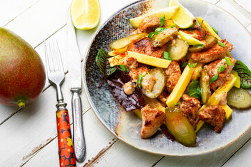 Fried chicken breast and mango