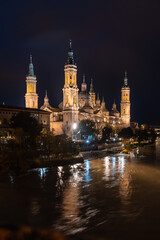 Fototapeta na wymiar Basílica de Nuestra Señora del Pilar on the Ebro river in the city of Zaragoza, Aragon. Spain