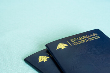 Selective focus on two Lebanese passports  - obrazy, fototapety, plakaty