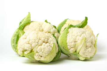 Cauliflower on a white background. Delicious and healthy vegetables. Vegetarian food.