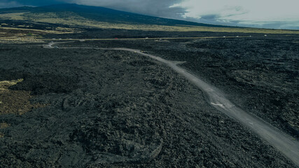 Chain of Craters Road in Hawaii Volcanoes National Park is vivid with blue ocean