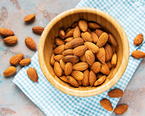 Almonds in brown bowl