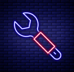 Glowing neon line Wrench spanner icon isolated on brick wall background. Spanner repair tool. Service tool symbol. Colorful outline concept. Vector