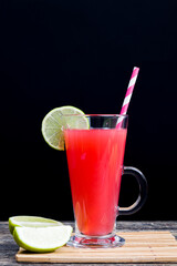 watermelon juice poured into a glass container