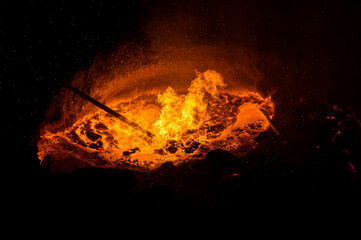 process of taking a sample of liquid metal in a steelmaking furnace