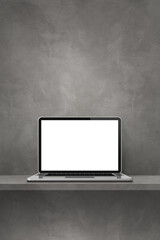 Laptop computer on grey shelf. Vertical background