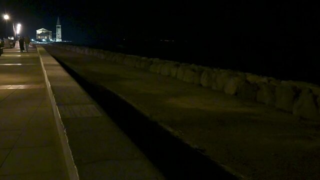 Along the sea of ​​Caorle at night.