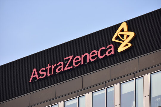 AstraZeneca sign, logo, symbol on the facade of AstraZeneca Poland, multinational pharmaceutical corporation, developer of COVID-19 vaccine. WARSAW, POLAND - NOVEMBER 28, 2021