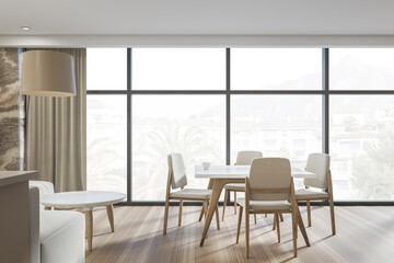 Dining room interior with beige sofa, four chair, panoramic window