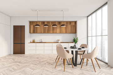 Minimalist white and wood kitchen with dining table