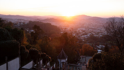 View of the stairway to the church of Bom Jesus do Monte in evening golden sunset, Braga, Portugal.