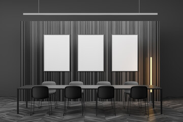 Three white boards in dark grey meeting room