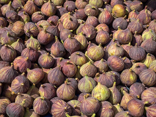 Fresh figs for sale at a market stall