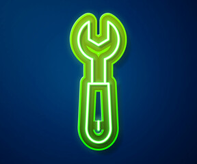 Glowing neon line Wrench spanner icon isolated on blue background. Vector