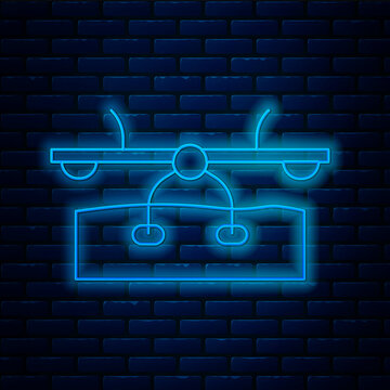 Glowing Neon Line Seesaw Icon Isolated On Brick Wall Background. Teeter Equal Board. Playground Symbol. Vector