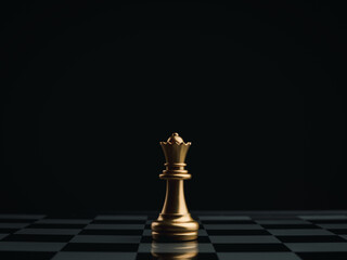 Close up the golden queen chess piece standing alone on a chessboard on dark background. Leader,...