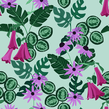 Seamless vector illustration with beautiful tropical flowers and leaves on a green background.