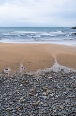 Stones in sand beach