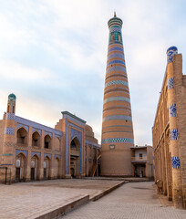 The Islam Khoja (or Hozha) minaret, Ichan Kala (or Itchan Qala is walled inner town of the city of Khiva, a UNESCO World Heritage Site), Khiva city, Uzbekistan.