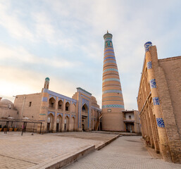 The Islam Khoja (or Hozha) minaret, Ichan Kala (or Itchan Qala is walled inner town of the city of Khiva, a UNESCO World Heritage Site), Khiva city, Uzbekistan.