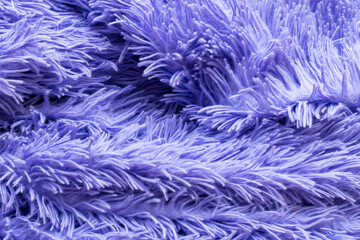 close-up of the villi and pile of a plush plaid or rug are very peri colors for the decoration of backdrops