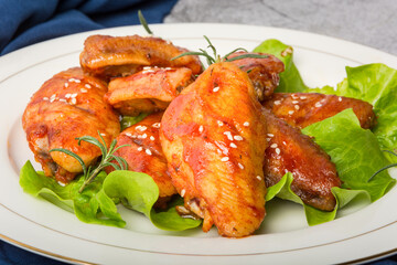 A plate of Orleans grilled chicken wings
