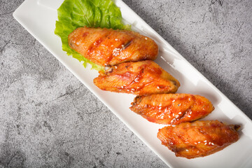 A plate of Orleans grilled chicken wings