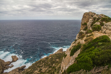 Fototapeta na wymiar Cabo Formentor (Cape Formentor) at Mallorca, Spain, on a cloudy day in October, wild seascape, rough coastline, cliffs