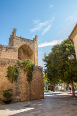 Fototapeta na wymiar Puerta de Mallorca (Porta de Mallorca), old stone building, important landmark at Alcudia, Mallorca island, Spain