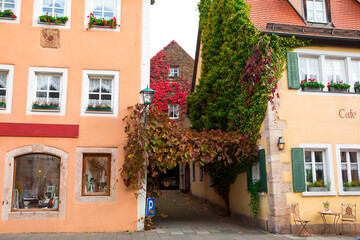 Fototapeta na wymiar Germany, Rothenburg, fairy tale town, old streets, businesses, green walls