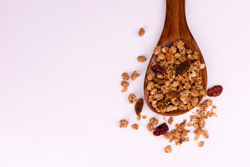 Wooden spoon with homemade granola. Copy space.