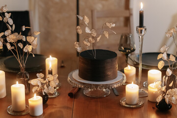 Minimalistic wedding cake on a serving table