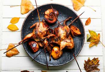 Quail barbecue with quince