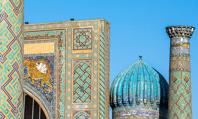 Uzbekistan, Samarkand, at the famous Registan Square. Details of  from facade of Sher-Dor Madrasah. 