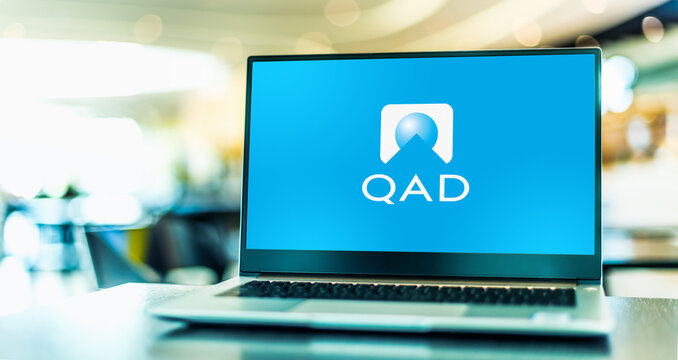 Laptop computer displaying logo of QAD Inc