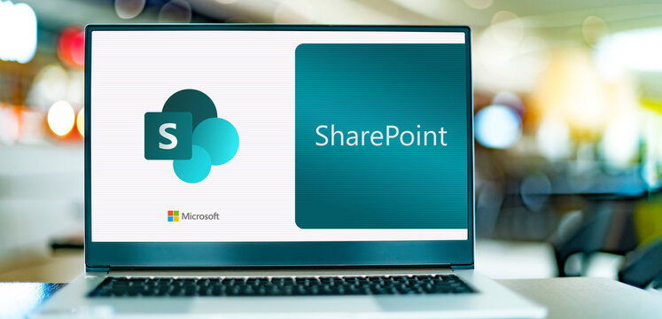 Laptop computer displaying logo of SharePoint