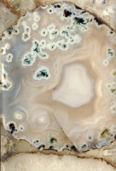 A piece of white agate with splashes, high resolution - 474521292