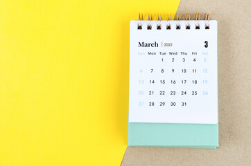 March 2022 desk calendar on beautiful background.