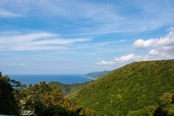 Fototapeta na wymiar Beautiful sky, sea, rocky coast and mountain landscape in Akita, Tohoku, Japan