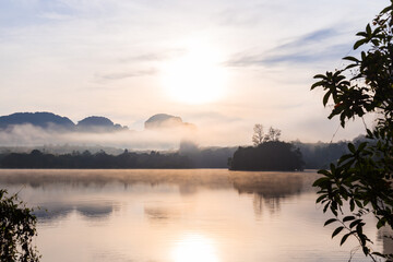 Ban Nong Thale the natural scenery of the sunshine in the morning (mountains, lakes, trees, fog) Thailand.