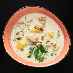 Soup with mussels and baconis in cream