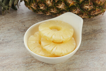 Marinated pineapple rings in the bowl