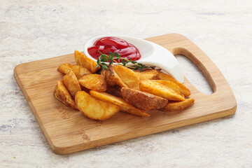 Fried rustic potato with tomato ketcup