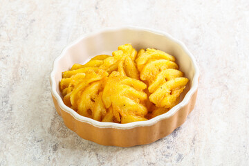 Fried potato slice in the bowl