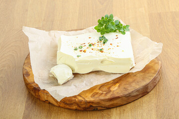Greek Feta cheese over board